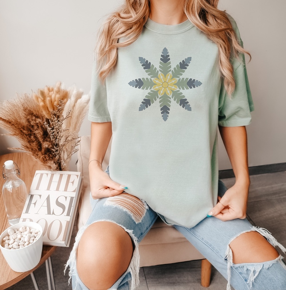 Fern-Armed Snowflake Radiating from a Golden Star Tee